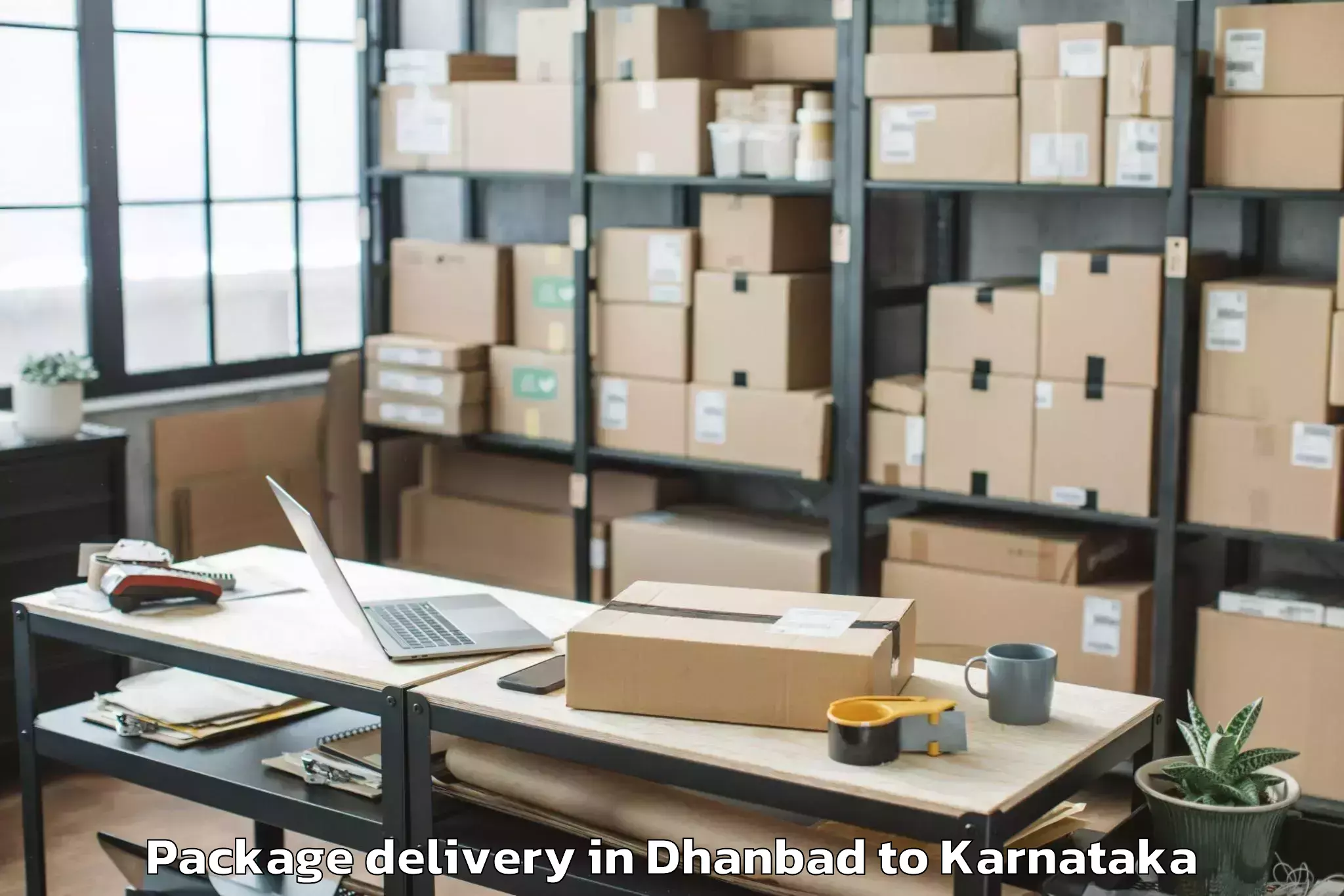 Dhanbad to Holesirigere Package Delivery Booking